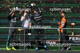 The podium (L to R): Lewis Hamilton (GBR) Mercedes AMG F1, second; Joey McMillan (GBR) Mercedes AMG F1 Lead Race Strategist; George Russell (GBR) Mercedes AMG F1, race winner; Oscar Piastri (AUS) McLaren, third. 28.07.2024. Formula 1 World Championship, Rd 14, Belgian Grand Prix, Spa Francorchamps, Belgium, Race Day.