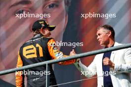 Oscar Piastri (AUS) McLaren celebrates his third position on the podium with Tom Kristensen (DEN) FIA Drivers' Commission President. 28.07.2024. Formula 1 World Championship, Rd 14, Belgian Grand Prix, Spa Francorchamps, Belgium, Race Day.