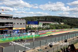 Race winner George Russell (GBR) Mercedes AMG F1 W15 takes the chequered flag at the end of the race ahead of second placed Lewis Hamilton (GBR) Mercedes AMG F1 W15 and third placed Oscar Piastri (AUS) McLaren MCL38. 28.07.2024. Formula 1 World Championship, Rd 14, Belgian Grand Prix, Spa Francorchamps, Belgium, Race Day.