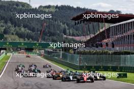 Charles Leclerc (MON) Ferrari SF-24 leads at the start of the race. 28.07.2024. Formula 1 World Championship, Rd 14, Belgian Grand Prix, Spa Francorchamps, Belgium, Race Day.