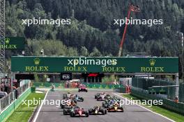 Charles Leclerc (MON) Ferrari SF-24 leads at the start of the race. 28.07.2024. Formula 1 World Championship, Rd 14, Belgian Grand Prix, Spa Francorchamps, Belgium, Race Day.