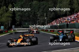 Oscar Piastri (AUS) McLaren MCL38 and George Russell (GBR) Mercedes AMG F1 W15. 28.07.2024. Formula 1 World Championship, Rd 14, Belgian Grand Prix, Spa Francorchamps, Belgium, Race Day.