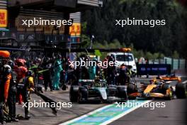 Lewis Hamilton (GBR) Mercedes AMG F1 W15 makes a pit stop ahead of Oscar Piastri (AUS) McLaren MCL38. 28.07.2024. Formula 1 World Championship, Rd 14, Belgian Grand Prix, Spa Francorchamps, Belgium, Race Day.