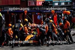 Lando Norris (GBR) McLaren MCL38 makes a pit stop. 28.07.2024. Formula 1 World Championship, Rd 14, Belgian Grand Prix, Spa Francorchamps, Belgium, Race Day.