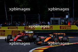 Charles Leclerc (MON) Ferrari SF-24 and Oscar Piastri (AUS) McLaren MCL38 battle for position. 28.07.2024. Formula 1 World Championship, Rd 14, Belgian Grand Prix, Spa Francorchamps, Belgium, Race Day.