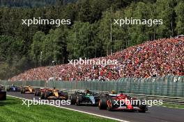 Charles Leclerc (MON) Ferrari SF-24 leads at the start of the race. 28.07.2024. Formula 1 World Championship, Rd 14, Belgian Grand Prix, Spa Francorchamps, Belgium, Race Day.