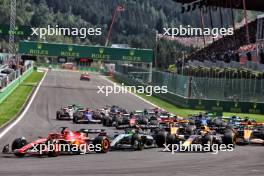 Charles Leclerc (MON) Ferrari SF-24 leads at the start of the race. 28.07.2024. Formula 1 World Championship, Rd 14, Belgian Grand Prix, Spa Francorchamps, Belgium, Race Day.