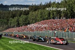 Charles Leclerc (MON) Ferrari SF-24 leads at the start of the race. 28.07.2024. Formula 1 World Championship, Rd 14, Belgian Grand Prix, Spa Francorchamps, Belgium, Race Day.