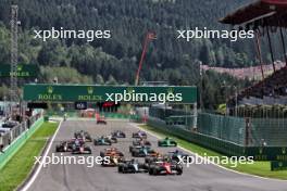 Charles Leclerc (MON) Ferrari SF-24 leads at the start of the race. 28.07.2024. Formula 1 World Championship, Rd 14, Belgian Grand Prix, Spa Francorchamps, Belgium, Race Day.