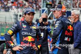 (L to R): Sergio Perez (MEX) Red Bull Racing with team mate Max Verstappen (NLD) Red Bull Racing in qualifying parc ferme. 27.07.2024. Formula 1 World Championship, Rd 14, Belgian Grand Prix, Spa Francorchamps, Belgium, Qualifying Day.