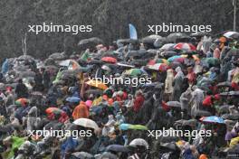 Circuit atmosphere - fans in the rain. 27.07.2024. Formula 1 World Championship, Rd 14, Belgian Grand Prix, Spa Francorchamps, Belgium, Qualifying Day.