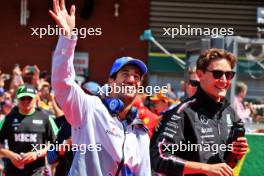 (L to R): Daniel Ricciardo (AUS) RB and George Russell (GBR) Mercedes AMG F1 on the drivers' parade. 28.07.2024. Formula 1 World Championship, Rd 14, Belgian Grand Prix, Spa Francorchamps, Belgium, Race Day.