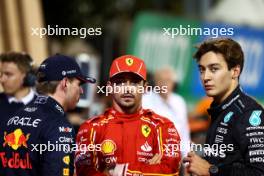 (L to R): pole sitter Max Verstappen (NLD) Red Bull Racing with Charles Leclerc (MON) Ferrari and George Russell (GBR) Mercedes AMG F1 in qualifying parc ferme. 01.03.2024. Formula 1 World Championship, Rd 1, Bahrain Grand Prix, Sakhir, Bahrain, Qualifying Day.