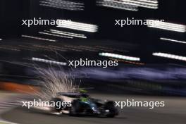 Lewis Hamilton (GBR) Mercedes AMG F1 W15 sends sparks flying. 01.03.2024. Formula 1 World Championship, Rd 1, Bahrain Grand Prix, Sakhir, Bahrain, Qualifying Day.