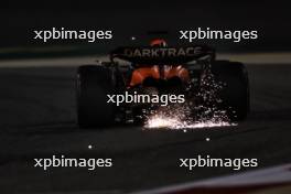 Oscar Piastri (AUS) McLaren MCL38 sends sparks flying. 01.03.2024. Formula 1 World Championship, Rd 1, Bahrain Grand Prix, Sakhir, Bahrain, Qualifying Day.