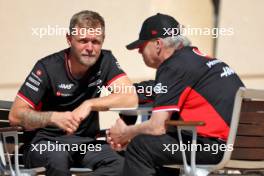 (L to R): Kevin Magnussen (DEN) Haas F1 Team with Gene Haas (USA) Haas Automotion President. 01.03.2024. Formula 1 World Championship, Rd 1, Bahrain Grand Prix, Sakhir, Bahrain, Qualifying Day.