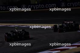 (L to R): Lewis Hamilton (GBR) Mercedes AMG F1 W15 and team mate George Russell (GBR) Mercedes AMG F1 W15. 01.03.2024. Formula 1 World Championship, Rd 1, Bahrain Grand Prix, Sakhir, Bahrain, Qualifying Day.