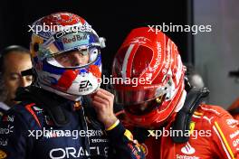 Pole sitter Max Verstappen (NLD) Red Bull Racing with Charles Leclerc (MON) Ferrari in qualifying parc ferme. 01.03.2024. Formula 1 World Championship, Rd 1, Bahrain Grand Prix, Sakhir, Bahrain, Qualifying Day.