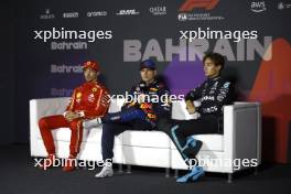 (L to R): Charles Leclerc (MON) Ferrari; Max Verstappen (NLD) Red Bull Racing; andf George Russell (GBR) Mercedes AMG F1, in the post qualifying FIA Press Conference. 01.03.2024. Formula 1 World Championship, Rd 1, Bahrain Grand Prix, Sakhir, Bahrain, Qualifying Day.