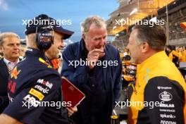 (L to R): Adrian Newey (GBR) Red Bull Racing Chief Technical Officer with Jeremy Clarkson (GBR) and Zak Brown (USA) McLaren Executive Director on the grid. 02.03.2024. Formula 1 World Championship, Rd 1, Bahrain Grand Prix, Sakhir, Bahrain, Race Day.