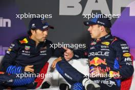 (L to R): Sergio Perez (MEX) Red Bull Racing and Max Verstappen (NLD) Red Bull Racing in the post race FIA Press Conference. 02.03.2024. Formula 1 World Championship, Rd 1, Bahrain Grand Prix, Sakhir, Bahrain, Race Day.