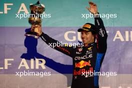 2nd place Sergio Perez (MEX) Red Bull Racing RB20. 02.03.2024. Formula 1 World Championship, Rd 1, Bahrain Grand Prix, Sakhir, Bahrain, Race Day.
