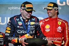 Race winner Max Verstappen (NLD) Red Bull Racing celebrates on the podium. 02.03.2024. Formula 1 World Championship, Rd 1, Bahrain Grand Prix, Sakhir, Bahrain, Race Day.
