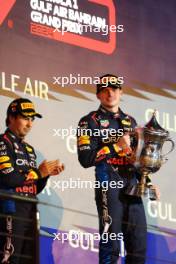 Race winner Max Verstappen (NLD) Red Bull Racing celebrates on the podium. 02.03.2024. Formula 1 World Championship, Rd 1, Bahrain Grand Prix, Sakhir, Bahrain, Race Day.