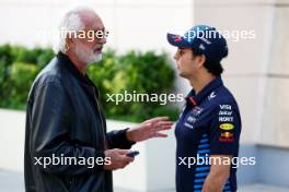 (L to R): Flavio Briatore (ITA) with Sergio Perez (MEX) Red Bull Racing. 02.03.2024. Formula 1 World Championship, Rd 1, Bahrain Grand Prix, Sakhir, Bahrain, Race Day.