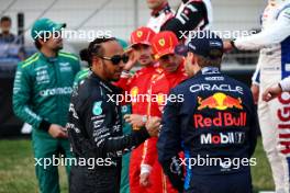 Lewis Hamilton (GBR) Mercedes AMG F1 with Sergio Perez (MEX) Red Bull Racing and Max Verstappen (NLD) Red Bull Racing. 02.03.2024. Formula 1 World Championship, Rd 1, Bahrain Grand Prix, Sakhir, Bahrain, Race Day.