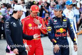 (L to R): Pierre Gasly (FRA) Alpine F1 Team with Carlos Sainz Jr (ESP) Ferrari and Sergio Perez (MEX) Red Bull Racing. 02.03.2024. Formula 1 World Championship, Rd 1, Bahrain Grand Prix, Sakhir, Bahrain, Race Day.