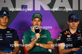 (L to R): Alexander Albon (THA) Williams Racing; Fernando Alonso (ESP) Aston Martin F1 Team; and Max Verstappen (NLD) Red Bull Racing, in the FIA Press Conference. 28.02.2024. Formula 1 World Championship, Rd 1, Bahrain Grand Prix, Sakhir, Bahrain, Preparation Day.