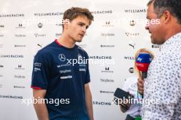 Logan Sargeant (USA) Williams Racing with Ted Kravitz (GBR) Sky Sports Pitlane Reporter. 28.02.2024. Formula 1 World Championship, Rd 1, Bahrain Grand Prix, Sakhir, Bahrain, Preparation Day.