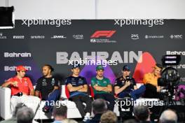 (L to R): Carlos Sainz Jr (ESP) Ferrari; Lewis Hamilton (GBR) Mercedes AMG F1; Alexander Albon (THA) Williams Racing; Fernando Alonso (ESP) Aston Martin F1 Team; Max Verstappen (NLD) Red Bull Racing; and Lando Norris (GBR) McLaren, in the FIA Press Conference. 28.02.2024. Formula 1 World Championship, Rd 1, Bahrain Grand Prix, Sakhir, Bahrain, Preparation Day.