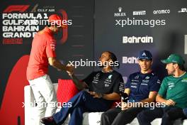 (L to R): Carlos Sainz Jr (ESP) Ferrari; Lewis Hamilton (GBR) Mercedes AMG F1; Alexander Albon (THA) Williams Racing; and Fernando Alonso (ESP) Aston Martin F1 Team, in the FIA Press Conference. 28.02.2024. Formula 1 World Championship, Rd 1, Bahrain Grand Prix, Sakhir, Bahrain, Preparation Day.