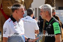 (L to R): Alan Permane (GBR) RB Sporting Director with Alessandro Alunni Bravi (ITA) Sauber Managing Director and Team Representative. 28.02.2024. Formula 1 World Championship, Rd 1, Bahrain Grand Prix, Sakhir, Bahrain, Preparation Day.