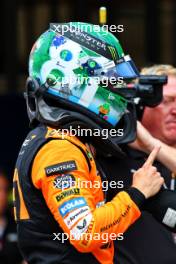 Oscar Piastri (AUS) McLaren celebrates his pole position in Sprint qualifying parc ferme. 01.11.2024. Formula 1 World Championship, Rd 21, Brazilian Grand Prix, Sao Paulo, Brazil, Sprint Qualifying Day.