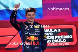 Race winner Max Verstappen (NLD) Red Bull Racing celebrates on the podium. 03.11.2024. Formula 1 World Championship, Rd 21, Brazilian Grand Prix, Sao Paulo, Brazil, Race Day.