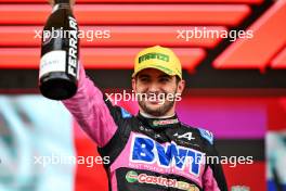 Esteban Ocon (FRA) Alpine F1 Team celebrates his second position on the podium. 03.11.2024. Formula 1 World Championship, Rd 21, Brazilian Grand Prix, Sao Paulo, Brazil, Race Day.