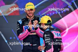 (L to R): Pierre Gasly (FRA) Alpine F1 Team celebrates his third position with second placed team mate Esteban Ocon (FRA) Alpine F1 Team on the podium. 03.11.2024. Formula 1 World Championship, Rd 21, Brazilian Grand Prix, Sao Paulo, Brazil, Race Day.