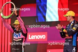 Esteban Ocon (FRA) Alpine F1 Team celebrates his second position on the podium. 03.11.2024. Formula 1 World Championship, Rd 21, Brazilian Grand Prix, Sao Paulo, Brazil, Race Day.