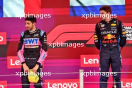 (L to R): second placed Esteban Ocon (FRA) Alpine F1 Team on the podium with race winner Max Verstappen (NLD) Red Bull Racing. 03.11.2024. Formula 1 World Championship, Rd 21, Brazilian Grand Prix, Sao Paulo, Brazil, Race Day.