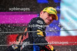 Race winner Max Verstappen (NLD) Red Bull Racing celebrates on the podium. 03.11.2024. Formula 1 World Championship, Rd 21, Brazilian Grand Prix, Sao Paulo, Brazil, Race Day.