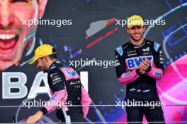 (L to R): Pierre Gasly (FRA) Alpine F1 Team celebrates his third position with second placed team mate Esteban Ocon (FRA) Alpine F1 Team on the podium. 03.11.2024. Formula 1 World Championship, Rd 21, Brazilian Grand Prix, Sao Paulo, Brazil, Race Day.