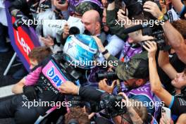 Pierre Gasly (FRA) Alpine F1 Team celebrates his third position with the team in parc ferme. 03.11.2024. Formula 1 World Championship, Rd 21, Brazilian Grand Prix, Sao Paulo, Brazil, Race Day.