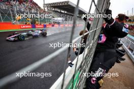 Pierre Gasly (FRA) Alpine F1 Team celebrates his third position as he passes the team at the end of the race. 03.11.2024. Formula 1 World Championship, Rd 21, Brazilian Grand Prix, Sao Paulo, Brazil, Race Day.