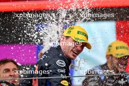 Race winner Max Verstappen (NLD) Red Bull Racing celebrates on the podium. 03.11.2024. Formula 1 World Championship, Rd 21, Brazilian Grand Prix, Sao Paulo, Brazil, Race Day.