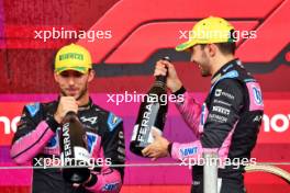 (L to R): Pierre Gasly (FRA) Alpine F1 Team celebrates his third position with second placed team mate Esteban Ocon (FRA) Alpine F1 Team on the podium. 03.11.2024. Formula 1 World Championship, Rd 21, Brazilian Grand Prix, Sao Paulo, Brazil, Race Day.