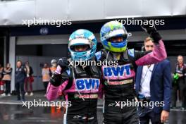 (L to R): Pierre Gasly (FRA) Alpine F1 Team celebrates his third position with second placed team mate Esteban Ocon (FRA) Alpine F1 Team in parc ferme. 03.11.2024. Formula 1 World Championship, Rd 21, Brazilian Grand Prix, Sao Paulo, Brazil, Race Day.