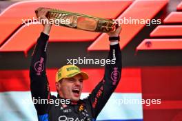 Race winner Max Verstappen (NLD) Red Bull Racing celebrates on the podium. 03.11.2024. Formula 1 World Championship, Rd 21, Brazilian Grand Prix, Sao Paulo, Brazil, Race Day.